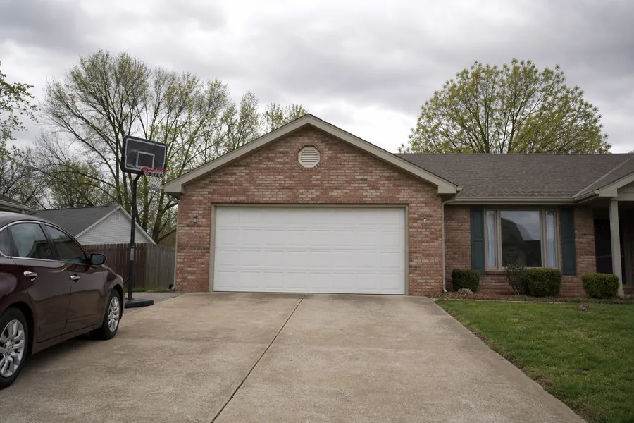A house with an attached garage in Springfield, MO